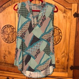 Turquoise patchwork sleeveless tunic.